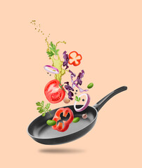 Different vegetables, oil, frying pan in air on pale coral background