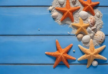 Starfish and scattered sand on a blue wooden plank surface