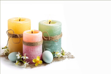 Decorative Easter candles over white layout with copy space for advertisement