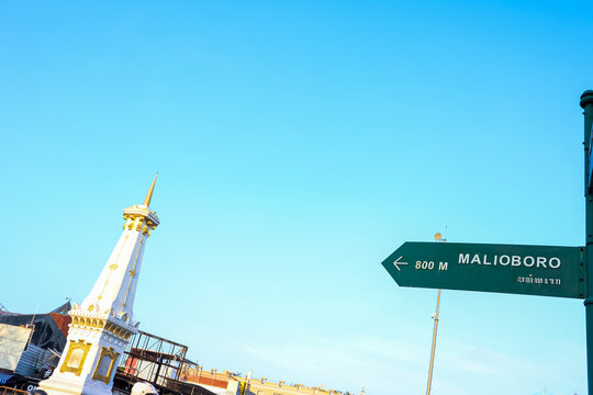 Road signboard, direction to Malioboro street with Tugu Jogja scene, Yogyakarta Indonesia