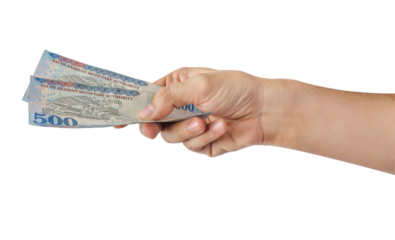 Hand-holding Saudi banknotes isolated on a white background.