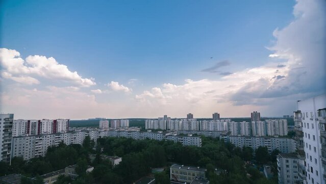 Timelapse of cumulonimbus clouds before thunderstorm in the city