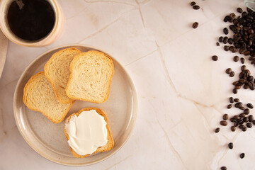 Toast with cream cheese in a marbled background in aerial view mockup