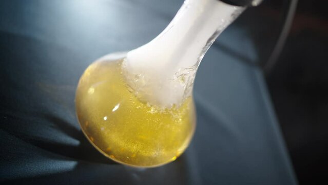 Close-up image of hookah. Slow motion view of the smoke. The hookah made on apple juice or white wine. Fun, entertainment, relaxation concept. People spend time in bar. Harmful habit. Tabaco smoking