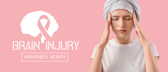 Teenage girl after chemotherapy suffering from headache on pink background, closeup