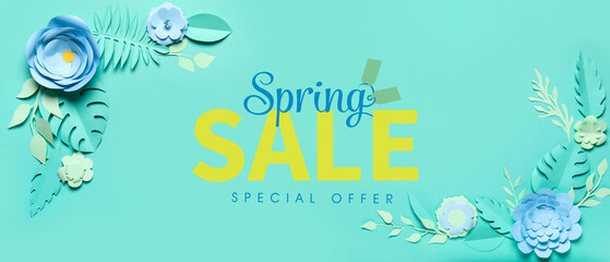 Frame made of paper flowers with leaves on green background