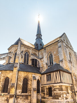 Sunshine through the spire of the Holy Savior church in Les Andelys