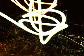 Long exposure of night lights in big city. Urban light trails from buildings and street lights in...