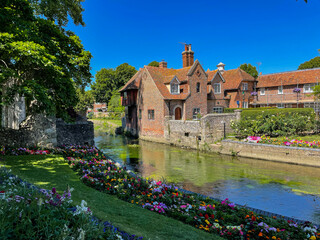Fototapeta na wymiar Charming old brick house by the River Stour in picturesque town of Canterbury