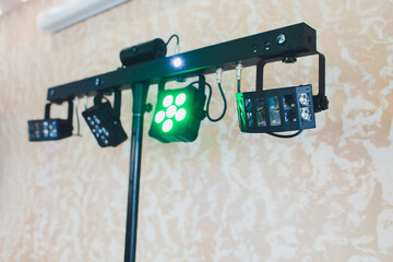 Illuminated way to boxing ring inside fight club multi-colored lights.