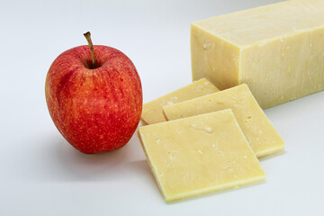 Sliced cheddar cheese and gala apple.