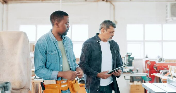 Carpenter, woodwork and apprentice with mentor in workshop, discussion and walking. Wood, intern and people together to work, teaching or learning on tablet at manufacturing factory for construction