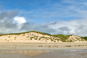 Five Finger Strand, one of the most famous beaches in Inishowen known for its pristine sand and rocky coastline with some of the highest sand dunes in Europe, county Donegal, Ireland.