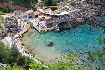 Beautiful aerial view of "Cala Deia", one of the most amazing spots in Mallorca island, Balearic Islands, Spain.