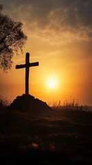 Silhouette of cross on beautiful spring sunset. Easter theme.