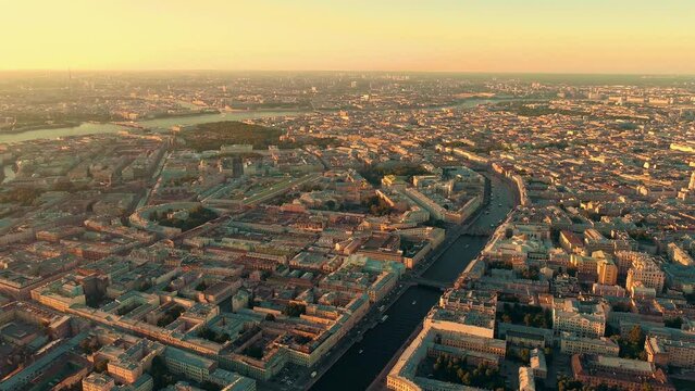 SAINT-PETERSBURG, RUSSIA - JUNE, 2023: Aerial drone view of the old city center in white nights. Flight over Fontanka river at beautiful sunset.