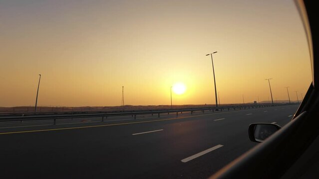 Travel By The Dubai Highway At Sunset