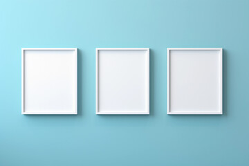 Three empty white frames for mockup hanging on blue wall, adding a minimalist touch to the room decor.