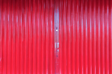 Rolling door steel stripe texture with handle in red color