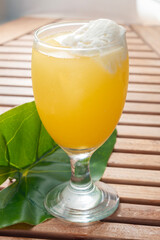 A Glass of Beras Kencur Float