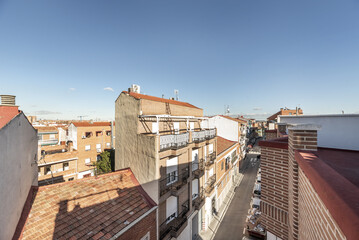 Views of buildings on an urban street in a residential neighborhood