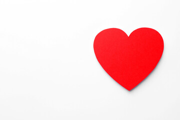 One paper heart on white background, top view. Space for text