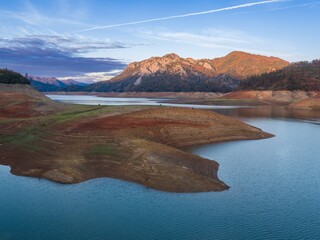 Reservoir of Lake Shasta in low water level in Shasta, California, United States.