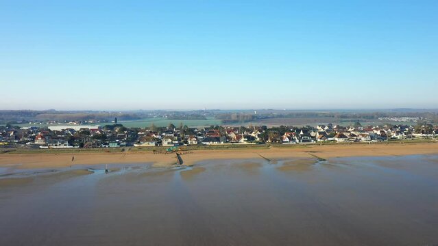 The houses at the edge of the beach of Sword beach in Europe, in France, in Normandy, towards Caen, in Hermanville, in spring, on a sunny day.