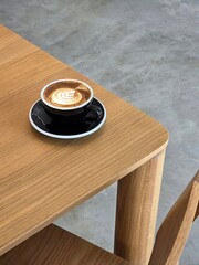 Nice Texture of Latte art on hot latte coffee . Milk foam in heart shape leaf tree on top of latte art from professional barista artist	 - 738429992