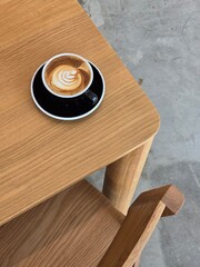 Nice Texture of Latte art on hot latte coffee . Milk foam in heart shape leaf tree on top of latte art from professional barista artist	 - 738429995