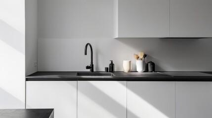 Clean and Sleek Minimalist Kitchen Design with White Cabinets and Black Quartz Countertop