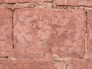 Fototapeta na wymiar Ancient Petroglyphs on Red Sandstone