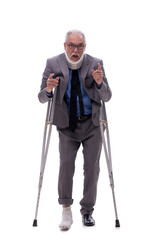 Old businessman after car accident isolated on white