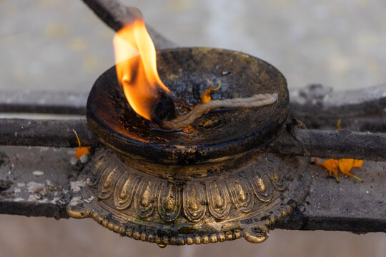 Prayer candle(Diyo) is lit by the devotees in temple, stupas as well as churches as a way of worshipping their god and goddess
