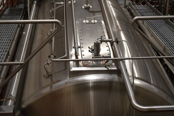 Stainless steel holding tank for milk. Lots of tubing.