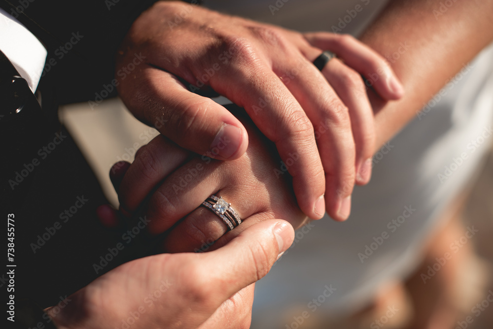 Wall mural A wedding ring is a finger ring typically worn on the base of the left ring finger, indicates that its wearer is married, usually forged from metal, traditionally gold or another precious metal