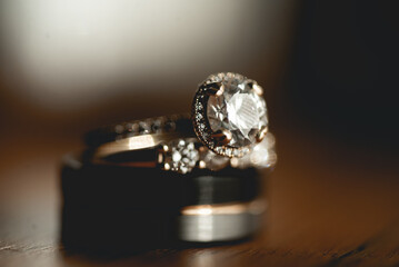 A wedding ring is a finger ring typically worn on the base of the left ring finger, usually forged from metal, traditionally gold or another precious metal. indicates that its wearer is married