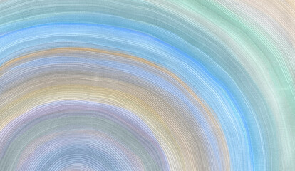 Colorful rainbow colors of tree rings background pattern with curved lines growing from center