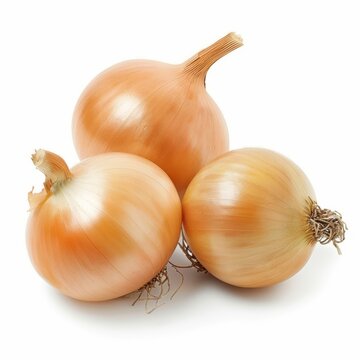 Three whole yellow onions isolated on white background