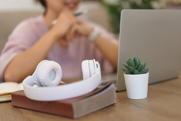 Female entrepreneur working to reading data on laptop and thoughtful about new startup project