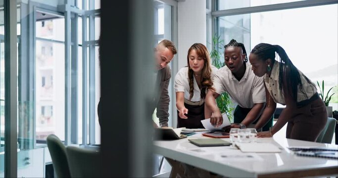 Meeting, discussion and team of business people in office boardroom working on project together. Diversity, documents and professional creative designers brainstorming in collaboration at workplace.