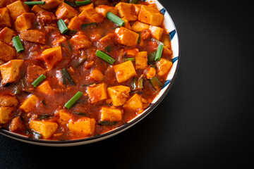 Mapo Tofu - The traditional Sichuan dish of silken tofu and ground beef, packed with mala flavor from chili oil and Sichuan peppercorns.