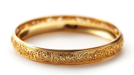 Big gold bangle bracelet with beautiful pattern isolated on white background.