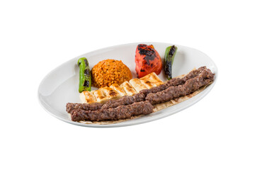 shish meatball kebab from turkish cuisine. served with white plate on white background