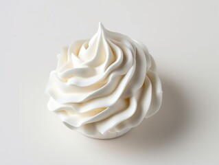 Whipped cream on white, appearing rounded and wavy.