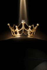 Fototapeta na wymiar golden crown on black background
