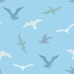 Flying seagulls seamless pattern. Vector background with silhouettes of sea birds on blue.