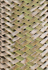 Woven pattern from a coconut leaf. Abstract nature background.