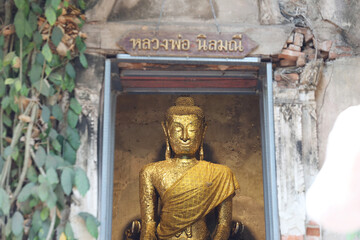 Buddha statue in old church at Wat Bang Kung, Amphawa distinct in Samut Songkhram province Thailand.