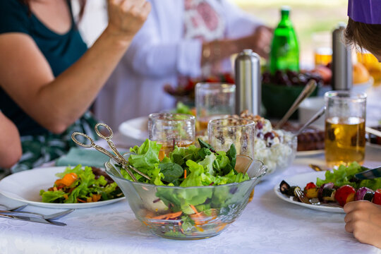 Fresh mango salad at Christmas lunch meal table with family